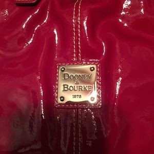 Red patten leather Downey and Burke purse .